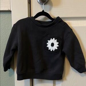 Cozy Black Kids Sweatshirt with White Flower Accent